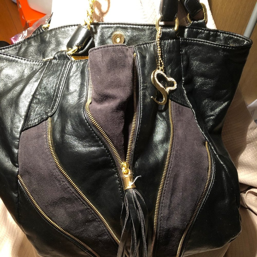 🎁 Serena Williams black handbag with tassel